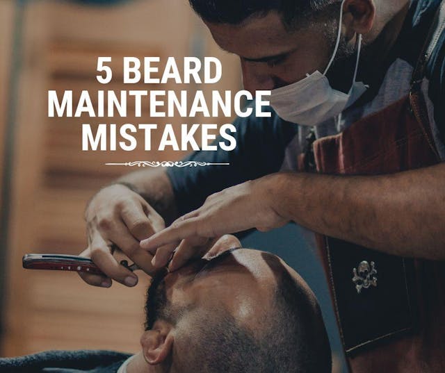 Barber trimming and lining another male beard