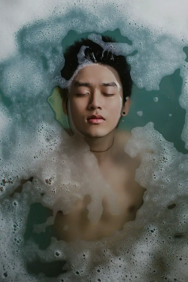 image of man in chlorine water